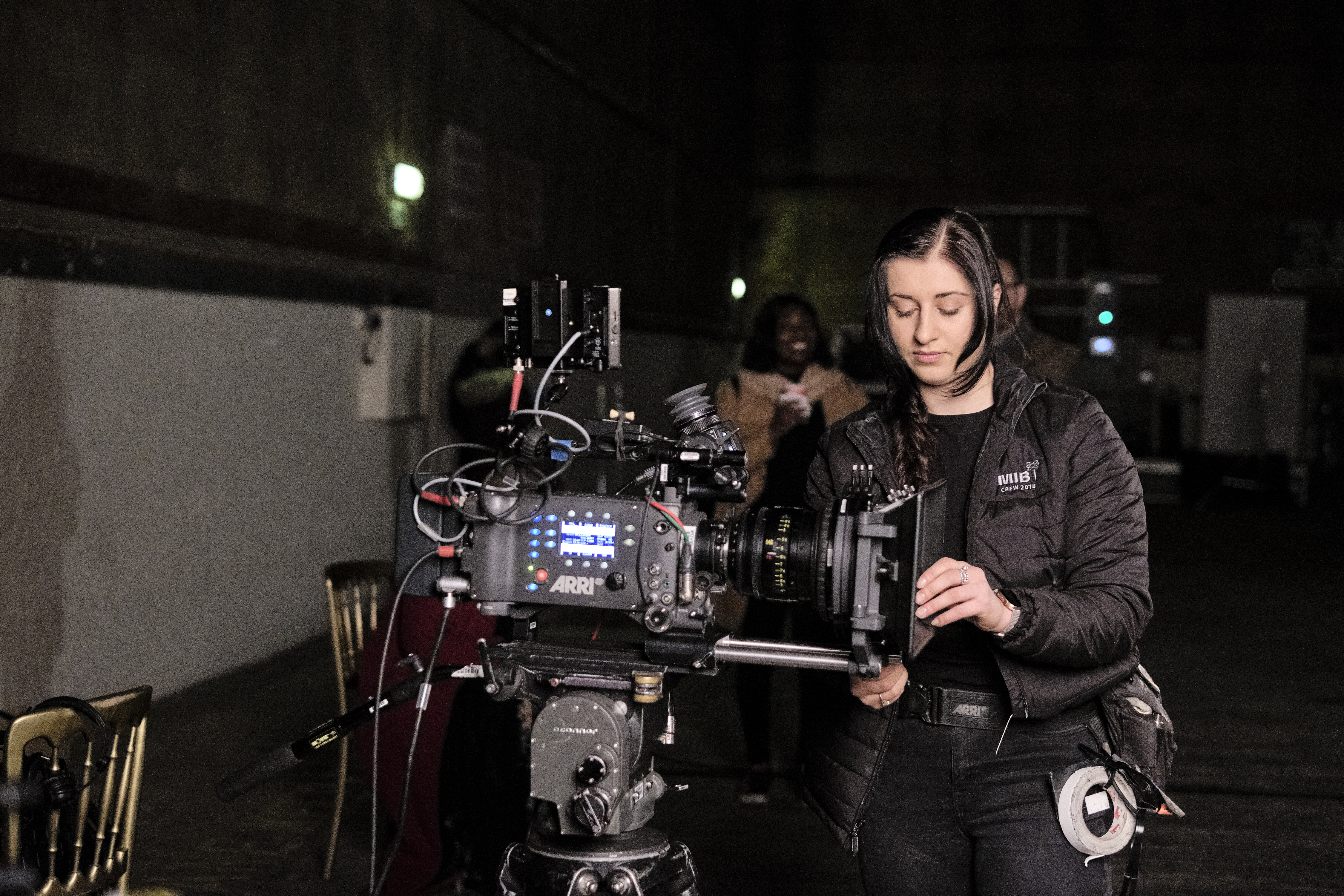 Camera trainee working a camera