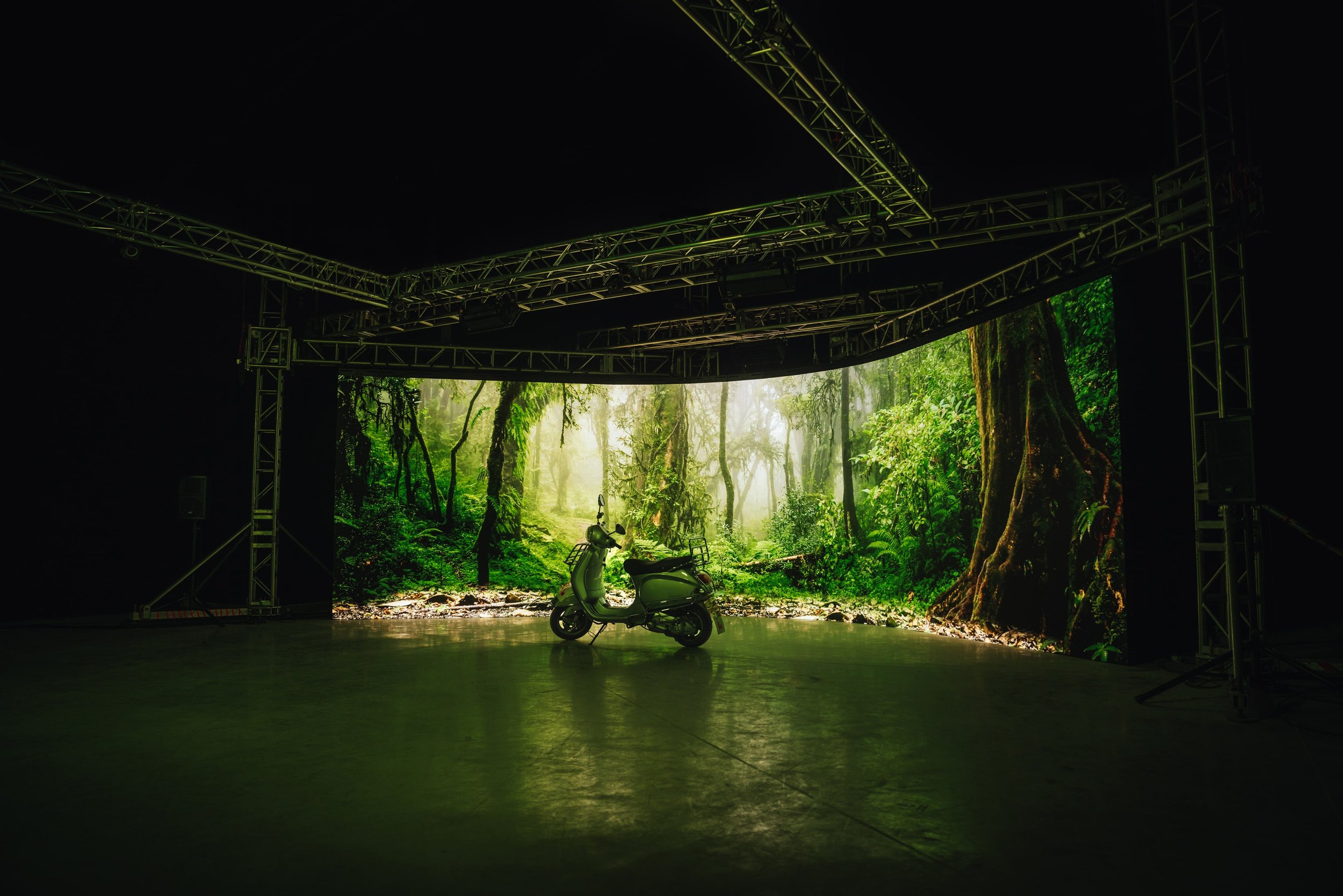 Vespa scooter in front of virtual production screen