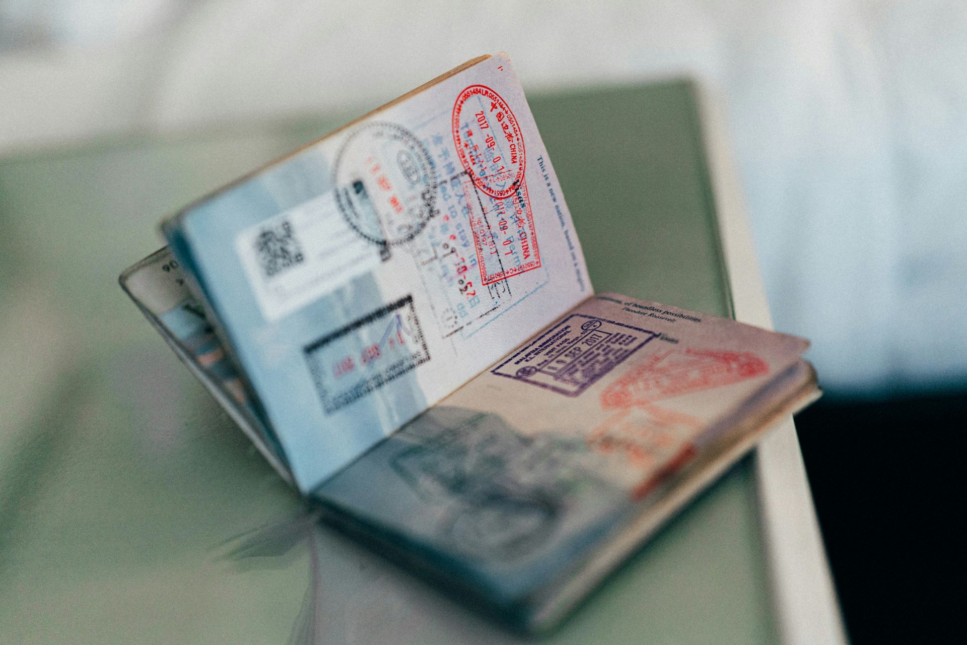 Close up generic image of a passport open with stamps on the pages