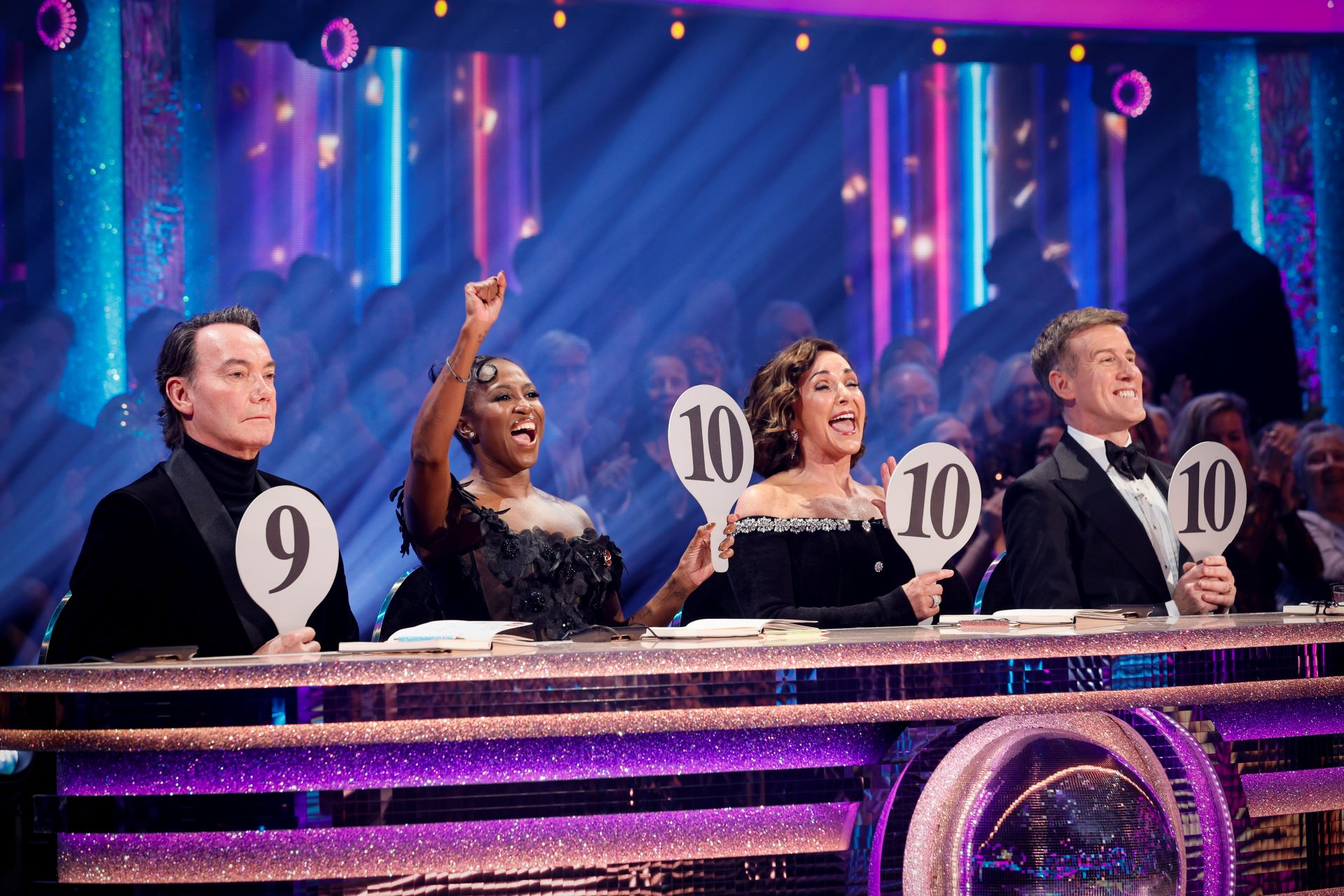 The four judges on the Strictly Come Dancing panel awarding scores