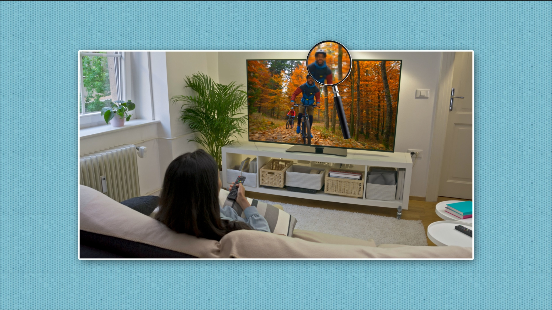 Screenshot from the module showing a person on a sofa watching the TV while holding a remote control