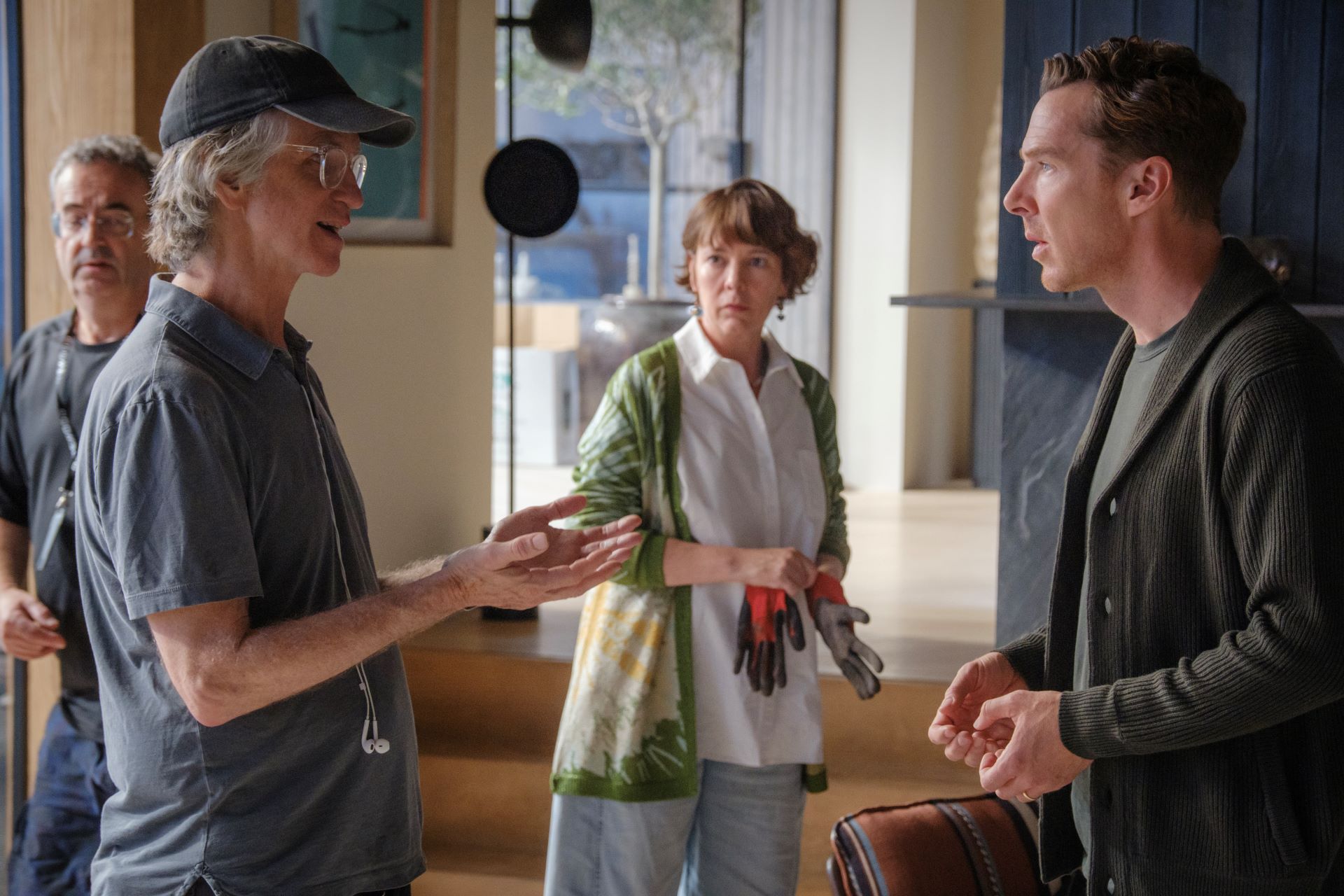 Director, Jay Roach, speaking to Benedict Cumberbatch and Olivia Coleman on the set of The Roses